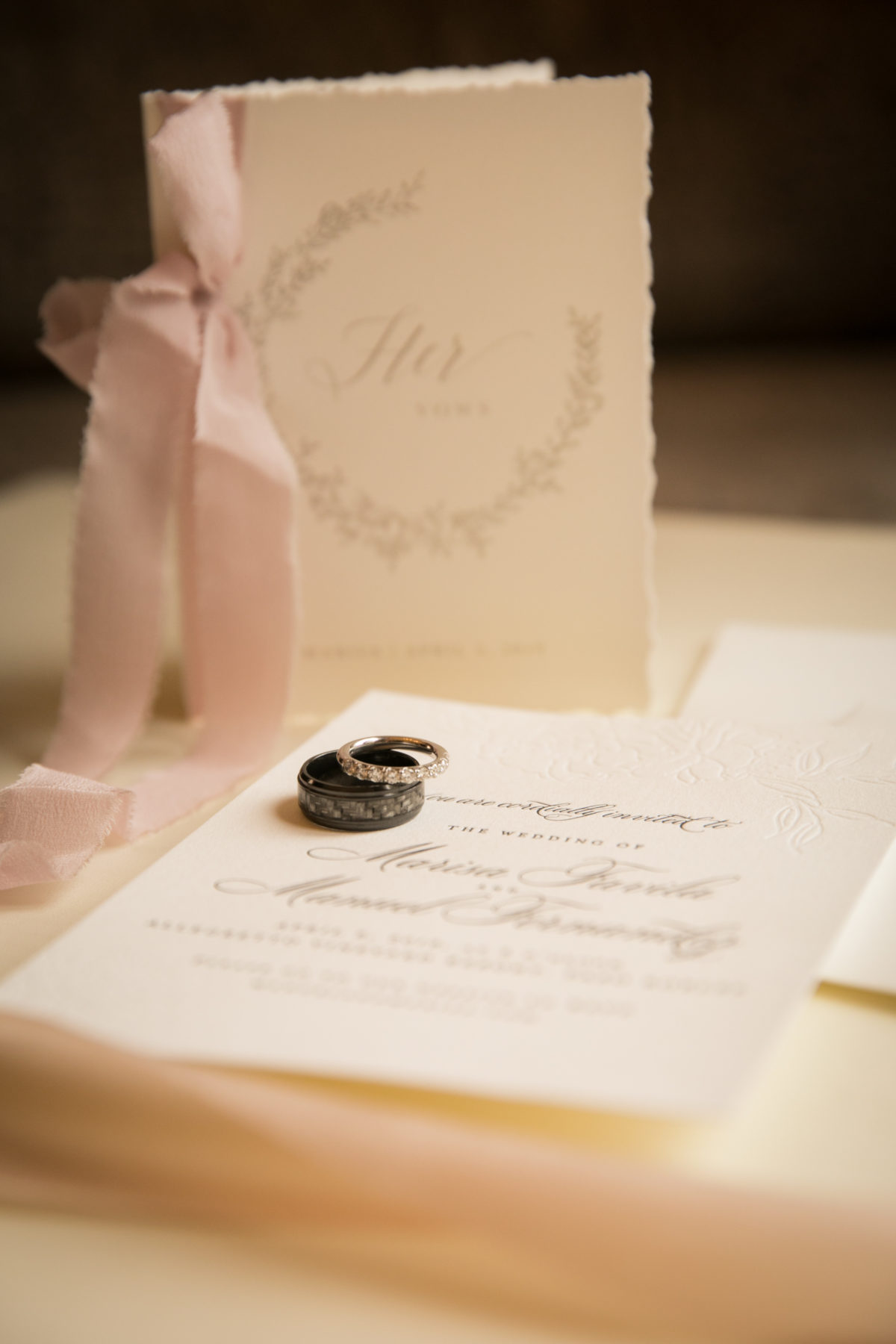 Bride and groom wedding rings with elegant