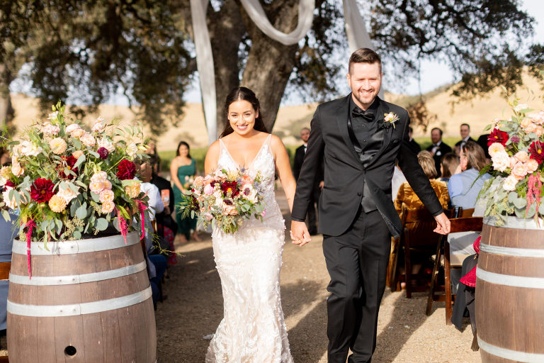 Cass Winery oak tree wedding ceremony with barrel arrangements by Flowers by Denise Paso Robles florist